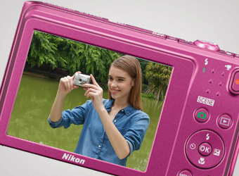 Girl enjoying her COOLPIX camera