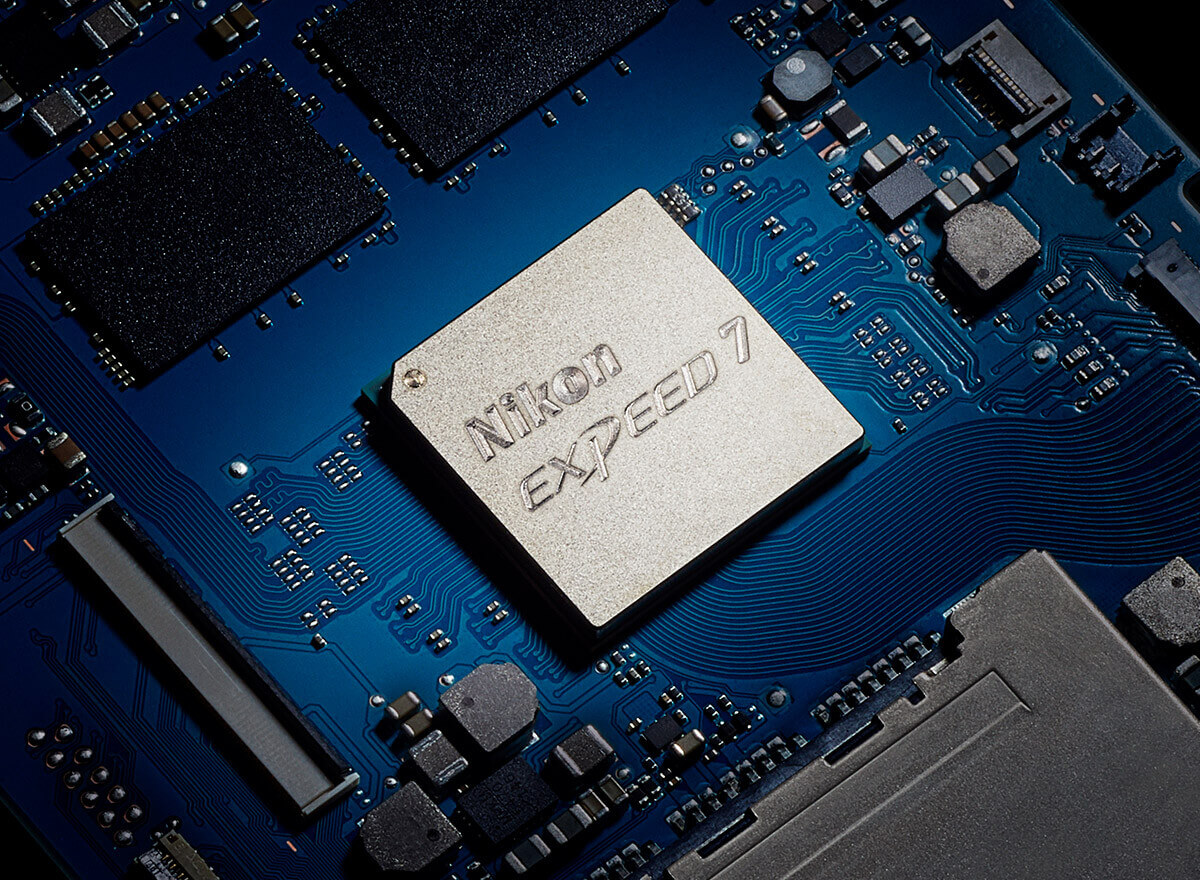 Photo of the Nikon EXPEED 7 image processor on a computer board