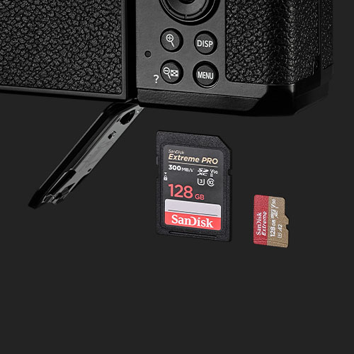 Photo shoping the bottom of the Z f camera with the battery/media card door and an SD card and MicroSD card
