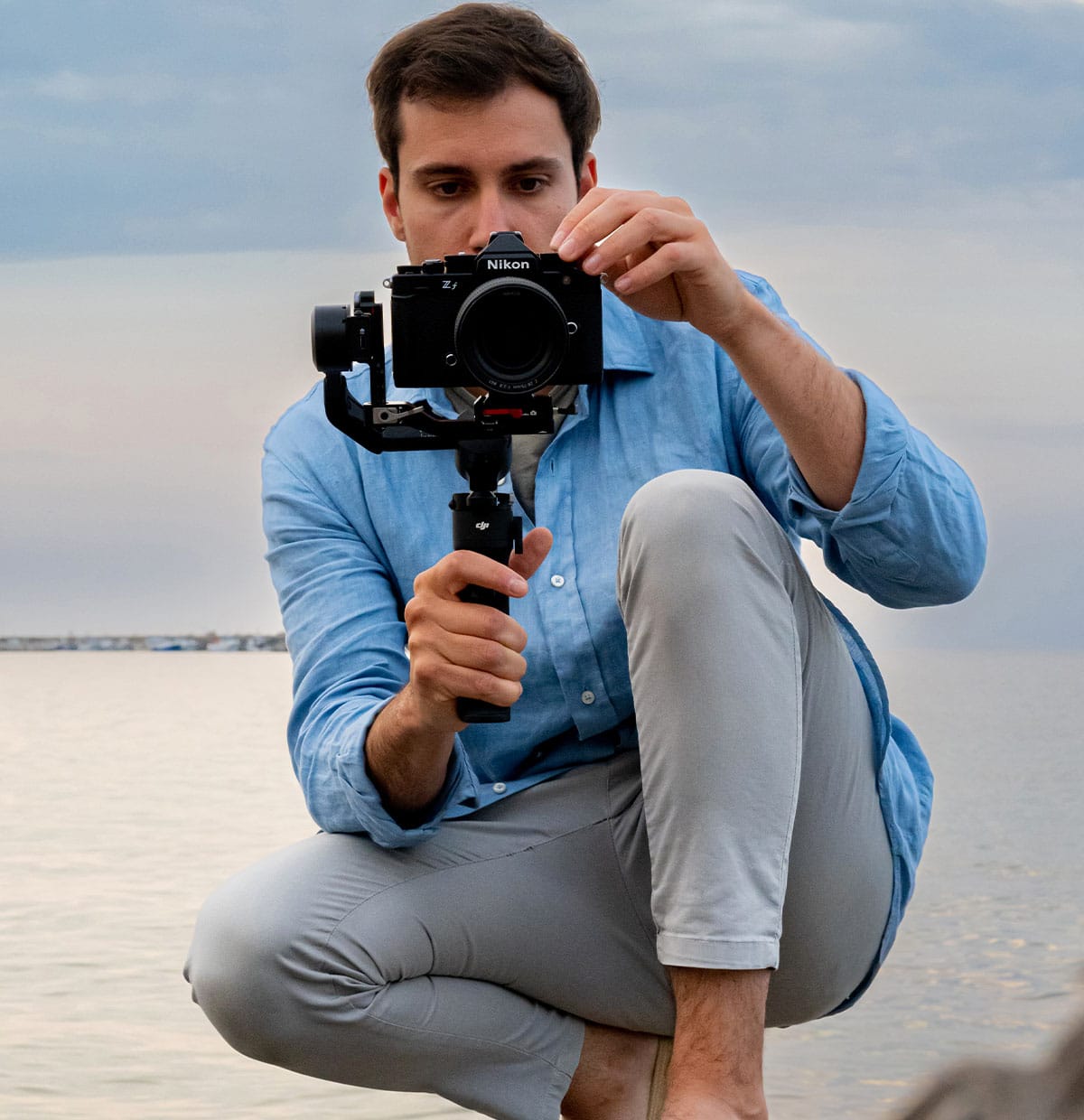Photo of a man on a beach with a Z f camera on a gimbal