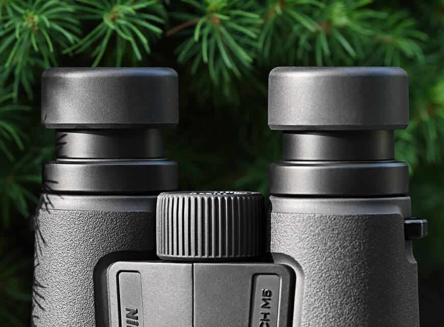 Close up of the eyecups of a pair of Monarch M5 binoculars
